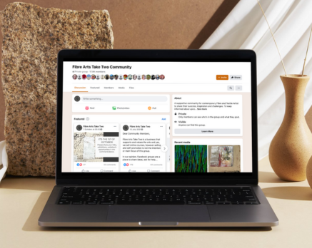Take Two Facebook community on laptop screen