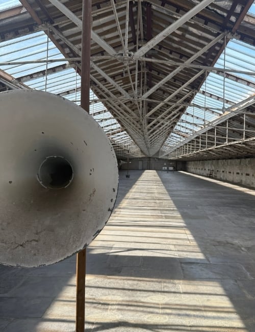 Revolving speaker in We Will Sing Ann Hamilton exhibition