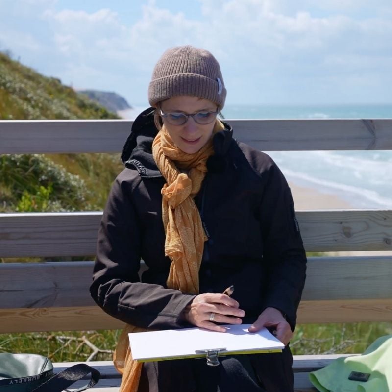 Eva Kalien sitting at the beach Eva Kalien sitting at the beach