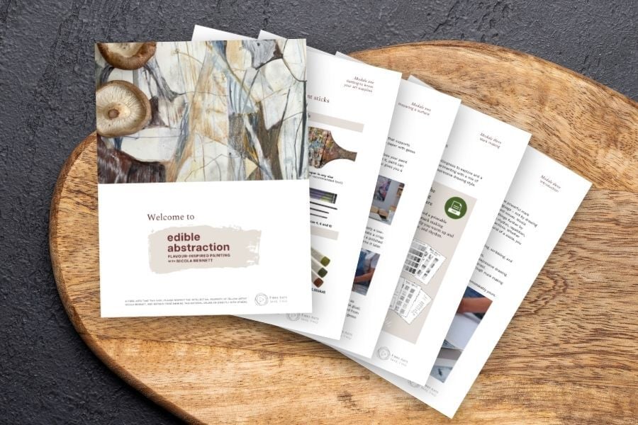 Mockups of resource guide pages on chopping board Mockups of resource guide pages on chopping board